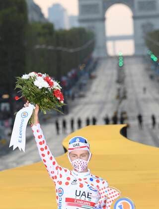 PARIS, FRANCE - SEPTEMBER 20 : POGACAR Tadej (SLO) of UAE TEAM EMIRATES pictured with the polka dot jersey during the podium ceremony during stage 21 of the 107th edition of the 2020 Tour de France cycling race, a stage of 122 kms with start in Mantes-la-Jolie and finish at the Avenue des Champs Elysees in Paris on September 20, 2020 in Paris, France, 20 09 2020 CYCLISME : Tour de France - Etape 21 - Mantes la Jolie a Paris Champs Elysees - 20 09 2020 PhotoNews Panoramic 