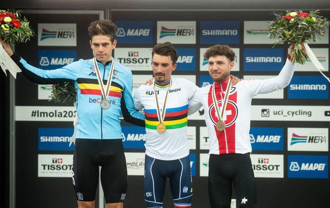 27.09.2020, Imola, ITA, UCI Strassenrad WM 2020, im Bild Second placed VAN AERT Wout of Belgium, World Champion ALAPHILIPPE Julian of France and third placed HIRSCHI Marc of Switzerland celebrate at medal ceremony during the UCI Road World Championships in Imola, Italy on 2020 09 27.