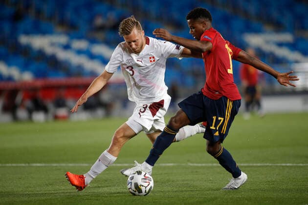 Partido de la UEFA Nations League entre Espana y Suiza en el estadio Alfredo Di Stefano. En la imagen, Ansu Fati y Widmer. UEFA Nations League match between Spain and Switzerland at the Alfredo Di Stefano stadium. In this picture, Ansu Fati and Widmer. 