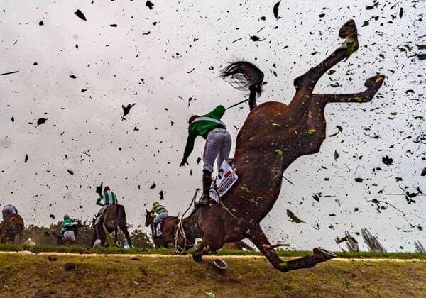 Bilder des Jahres 2020, Sport 10 Oktober Sport Themen der Woche KW41 Two horses of legendary coach Josef Vana Sottovento with jockey Jan Kratochvil (pictured) and No Time To Lose, fell on the Taxis ditch, the most feared obstacle in the 130th Grand Pardubice Steeplechase in Pardubice, Czech Republic, October 11, 2020. (CTKxPhoto RomanxVondrous) CTKPhotoP202010110564101 vnd 23