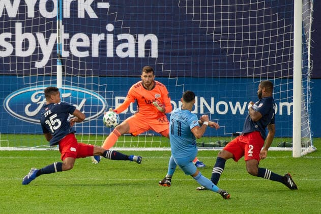 October 11, 2020, Bronx, NY, US: New England Revolution midfielder BRANDON BYE 15 block a shot on goal by New York City midfielder VALENTIN CASTELLANOS 11 during a regular season game at Yankees Stadium in Bronx, NY. New England Revolution defeats New York City FC 2-1 Bronx US - ZUMAs192 20201011_zap_s192_006 Copyright: xMarkxSmithx