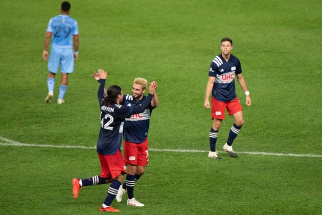 October 11, 2020, Bronx, NY, US: New England Revolution midfielder LEE NGUYEN 42 celebrates his goal with New England Revolution forward DIEGO FAGUNDEZ 14 during a regular season game at Yankees Stadium in Bronx, NY. New England Revolution defeats New York City FC 2-1 Bronx US - ZUMAs192 20201011_zap_s192_007 Copyright: xMarkxSmithx