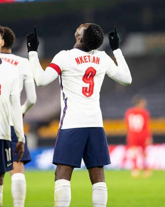13th October 2020; Molineux Stadium, Wolverhampton, West Midlands, England; UEFA Under 21 European Championship, EM, Europameisterschaft Qualifiers, Group Three, England Under 21 versus Turkey Under 21; Eddie Nketiah of England with his hands in the air after scoring in the last minutes of the match for 2-0  ActionPlus12240801 RolandxHarrison