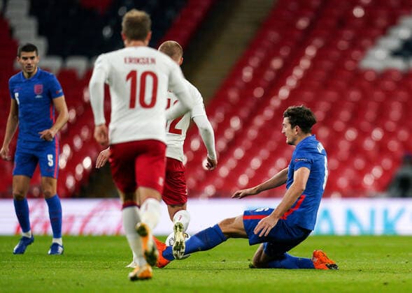 Harry Maguire Manchester United, ManU of England fouls Kasper Dolberg (Nice) of Denmark and is subsequently sent off for a 2nd yellow card during the UEFA Nations League match played behind closed doors due to the current government Covid-19 rules within sports venues between England and Denmark at Wembley Stadium, London, England on 14 October 2020. Copyright: xAndyxRowlandx PMI-3658-0049