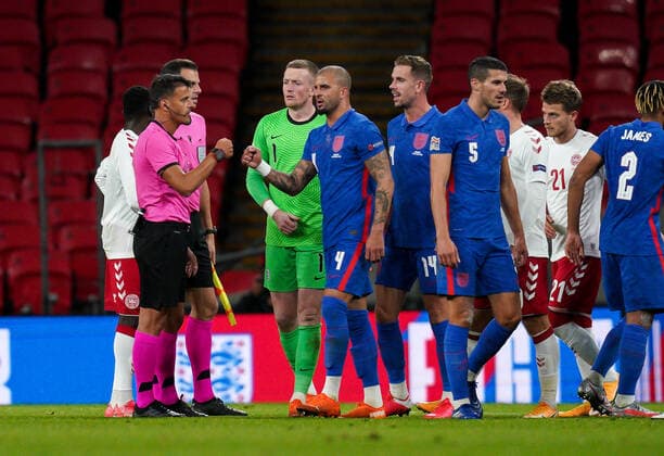 Kyle Walker (Manchester City) of England and Referee Jes?s Gil Manzano of Spain tap fists after the UEFA Nations League match played behind closed doors due to the current government Covid-19 rules within sports venues between England and Denmark at Wembley Stadium, London, England on 14 October 2020. Copyright: xAndyxRowlandx PMI-3658-0139