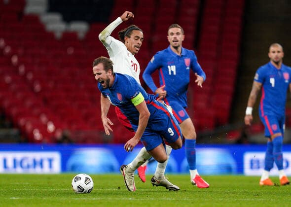 Harry Kane (Tottenham Hotspur) of England is fouled by Yussuf Poulsen (RB Leipzig) of Denmark during the UEFA Nations League match played behind closed doors due to the current government Covid-19 rules within sports venues between England and Denmark at Wembley Stadium, London, England on 14 October 2020. Copyright: xAndyxRowlandx PMI-3658-0149