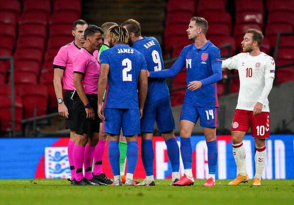 Reece James (Chelsea) of England confronts the Referee Jes?s Gil Manzano of Spain before being set off during the UEFA Nations League match played behind closed doors due to the current government Covid-19 rules within sports venues between England and Denmark at Wembley Stadium, London, England on 14 October 2020. Copyright: xAndyxRowlandx PMI-3658-0153