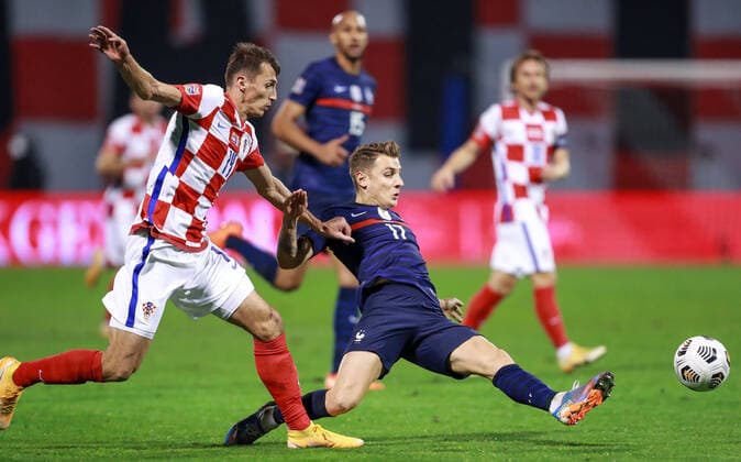 Ante Budimir of Croatia and Lucas Digne of France FOOTBALL : Croatie vs France - UEFA Ligue des Nations - Zagreb - 14 10 2020 Panoramic NikolaKrstic 