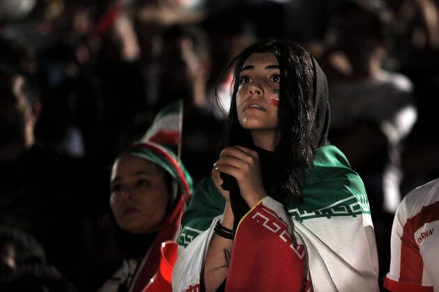 Iranian women allowed to watch football at stadium for first time in decades. Iranian female soccer fan pray for Iran National Football team during the match between Iran-Portugal 2018 at Azadi Stadium. For 38 years, women have been banned from watching men s sporting events in Iran. Finally, women would be allowed to watch a live broadcast of Iran s World Cup match against Portugal , taking place in Russia at TehranÕs Azadi Stadium on Jun 25, 2018, after FIFA threatened to suspend the country over its controversial male-only policy. Tehran Azadi Stadium Tehran Iran Copyright: xMaryam-Majdx