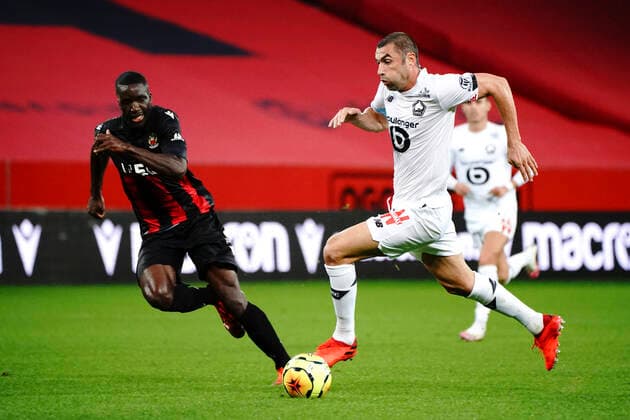 Burak Ylmaz (Lille) - Stanley NSoki (OGC Nice) FOOTBALL : OGC Nice vs Lille - Nice - 25 10 2020 NorbertScanella PanoramiC 