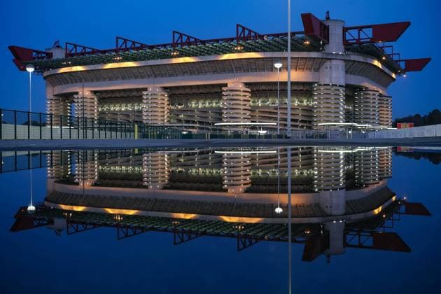 A general view of the stadium reflected in a puddle prior to the UEFA Champions League match at Giuseppe Meazza, Milan. Picture date: 29th October 2020. Picture credit should read: Jonathan Moscrop Sportimage EDITORIAL USE ONLY. No use with unauthorised audio, video, data, fixture lists, club league logos or live services. Online in-match use limited to 120 images, no video emulation. No use in betting, games or single club league player publications. SPI-0712-0002