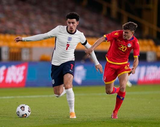 Curtis Jones of England and Izan Fernandez of Andorra during the UEFA EURO, EM, Europameisterschaft,Fussball U21, U 21 Qualifying match at Molineux, Wolverhampton. Picture date: 13th November 2020. Picture credit should read: Andrew Yates Sportimage EDITORIAL USE ONLY. No use with unauthorised audio, video, data, fixture lists, club league logos or live services. Online in-match use limited to 120 images, no video emulation. No use in betting, games or single club league player publications. SPI-0753-0004