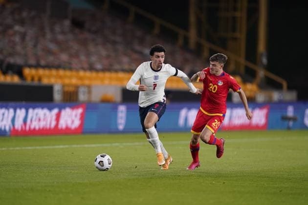 Curtis Jones of England takes on Izan Fernandez of Andorra during the UEFA EURO, EM, Europameisterschaft,Fussball U21, U 21 Qualifying match at Molineux, Wolverhampton. Picture date: 13th November 2020. Picture credit should read: Andrew Yates Sportimage EDITORIAL USE ONLY. No use with unauthorised audio, video, data, fixture lists, club league logos or live services. Online in-match use limited to 120 images, no video emulation. No use in betting, games or single club league player publications. SPI-0753-0006