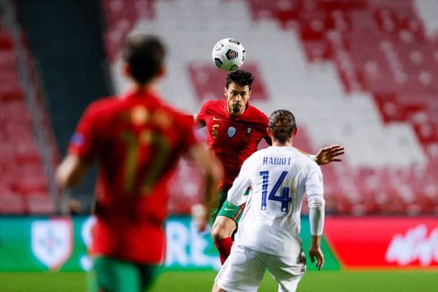 14th November 2020, The Est& xe1;dio da Luz, Lisbon, Portugal; Nations League International football, Portugal versus France; Jose Fonte of Portugal heads the ball clear of Rabiot of France  ActionPlus12247189 DiogoxPinto