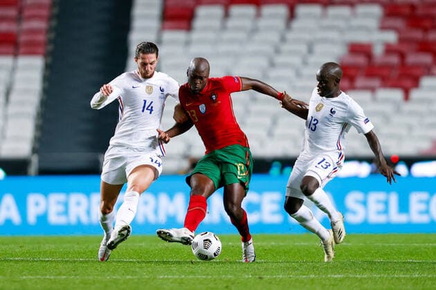 14th November 2020, The Est& xe1;dio da Luz, Lisbon, Portugal; Nations League International football, Portugal versus France; Danilo Pereira of Portugal is challenged by Adrien Rabiot and N Golo Kant& xe9; of France  ActionPlus12247191 DiogoxPinto
