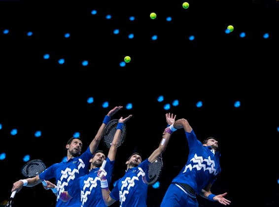 (201117) -- LONDON, Nov. 17, 2020 -- The multiple exposure photo shows Novak Djokovic of Serbia serving during the singles group match against Diego Schwartzman of Argentina at the ATP, Tennis Herren World Tour Finals 2020 in London, Britain, on Nov. 16, 2020. ) (SP)BRITAIN-LONDON-TENNIS-ATP FINALS-DAY 2 HanxYan 