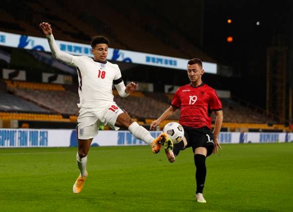 James Justin of England tackles Redon Xhixha of Albania during the UEFA EURO, EM, Europameisterschaft,Fussball U21, U 21 Qualifying match at Molineux, Wolverhampton. Picture date: 17th November 2020. Picture credit should read: Darren Staples Sportimage EDITORIAL USE ONLY. No use with unauthorised audio, video, data, fixture lists, club league logos or live services. Online in-match use limited to 120 images, no video emulation. No use in betting, games or single club league player publications. SPI-0758-0011