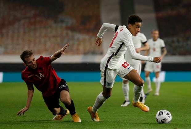 Jamal Musiala of England skips past Mario Mitaj of Albania during the UEFA EURO, EM, Europameisterschaft,Fussball U21, U 21 Qualifying match at Molineux, Wolverhampton. Picture date: 17th November 2020. Picture credit should read: Darren Staples Sportimage EDITORIAL USE ONLY. No use with unauthorised audio, video, data, fixture lists, club league logos or live services. Online in-match use limited to 120 images, no video emulation. No use in betting, games or single club league player publications. SPI-0758-0013