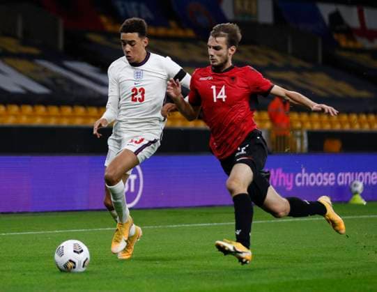 Jamal Musiala of England skips past Mario Mitaj of Albania during the UEFA EURO, EM, Europameisterschaft,Fussball U21, U 21 Qualifying match at Molineux, Wolverhampton. Picture date: 17th November 2020. Picture credit should read: Darren Staples Sportimage EDITORIAL USE ONLY. No use with unauthorised audio, video, data, fixture lists, club league logos or live services. Online in-match use limited to 120 images, no video emulation. No use in betting, games or single club league player publications. SPI-0758-0014
