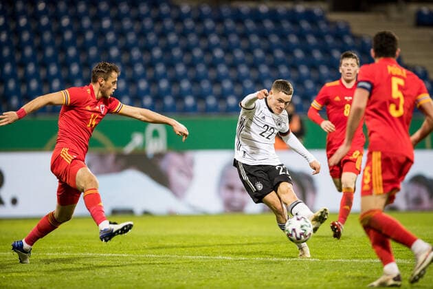 U21, U 21 EM-Qualifikationsspiel: Deutschland - Wales; 17.11.2020 Joe Cameron Lewis (Wales, 14), Florian Wirtz (Deutschland, 22) U21 EM-Qualifikationsspiel: Deutschland - Wales; Eintracht-Stadion; Braunschweig UEFA REGULATIONS PROHIBIT ANY USE OF PHOTOGRAPHS AS IMAGE SEQUENCES AND OR QUASI-VIDEO. Copyright: xBEAUTIFULxSPORTS Wunderlx
