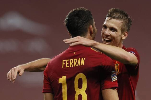 Spain s winger Ferran Torres (L) celebrates with his teammate Dani Olmo (R) after scoring the 5-0 during the UEFA Nations League group 4 soccer match between Spain and Germany at La Cartuja Stadium in Sevilla, Spain, 17 November 2020. Spain - Germany !ACHTUNG: NUR REDAKTIONELLE NUTZUNG!  Copyright: xJosexManuelxVidalx GRAFCAT4664 20201117-637412490578951480