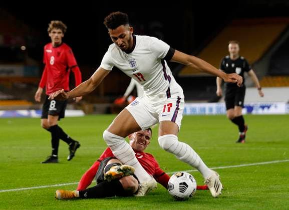 Albion Marku of Albania challenges Lloyd Kelly of England during the UEFA EURO, EM, Europameisterschaft,Fussball U21, U 21 Qualifying match at Molineux, Wolverhampton. Picture date: 17th November 2020. Picture credit should read: Darren Staples Sportimage EDITORIAL USE ONLY. No use with unauthorised audio, video, data, fixture lists, club league logos or live services. Online in-match use limited to 120 images, no video emulation. No use in betting, games or single club league player publications. SPI-0758-0080
