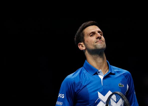 (201119) -- LONDON, Nov. 19, 2020 -- Novak Djokovic of Serbia looks dejected during the singles group match against Daniil Medvedev of Russia at the ATP, Tennis Herren World Tour Finals 2020 in London, Britain, on Nov. 18, 2020. ) (SP)BRITAIN-LONDON-TENNIS-ATP FINALS-DAY 4 HanxYan 