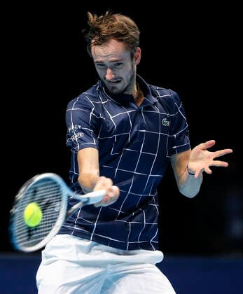 (201119) -- LONDON, Nov. 19, 2020 -- Daniil Medvedev of Russia hits a return during the singles group match against Novak Djokovic of Serbia at the ATP, Tennis Herren World Tour Finals 2020 in London, Britain, on Nov. 18, 2020. ) (SP)BRITAIN-LONDON-TENNIS-ATP FINALS-DAY 4 HanxYan 