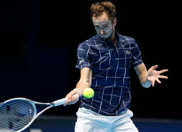 (201119) -- LONDON, Nov. 19, 2020 -- Daniil Medvedev of Russia hits a return during the singles group match against Novak Djokovic of Serbia at the ATP, Tennis Herren World Tour Finals 2020 in London, Britain, on Nov. 18, 2020. ) (SP)BRITAIN-LONDON-TENNIS-ATP FINALS-DAY 4 HanxYan 