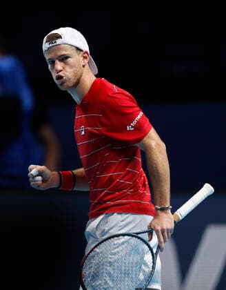 (201119) -- LONDON, Nov. 19, 2020 -- Diego Schwartzman of Argentina celebrates during the singles group match against Alexander Zverev of Germany at the ATP, Tennis Herren World Tour Finals 2020 in London, Britain, on Nov. 18, 2020. ) (SP)BRITAIN-LONDON-TENNIS-ATP FINALS-DAY 4 HanxYan 