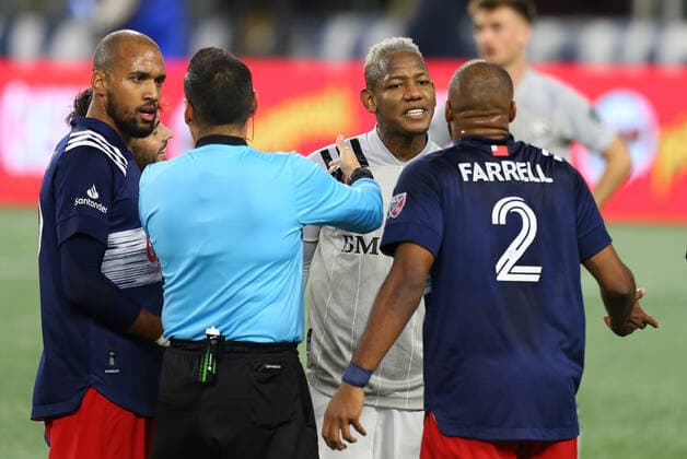 November 20, 2020; Foxborough, MA, USA; Montreal Impact forward Romell Quioto (30) exchanges words with New England Revolution defender Andrew Farrell (2) during the Eastern Conference Play-in round between Montreal Impact and New England Revolution at Gillette Stadium. CSM Foxborough United States - ZUMAc04_ 20201120_zaf_c04_025 Copyright: xAnthonyxNesmithx