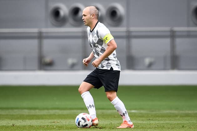 Spanish professional footballer Andres Iniesta of Vissel Kobe keeps the ball during the group match of 20 21 AFC Champions League (ACL) against Guangzhou Evergrande Taobao F.C., Doha city, Qatar, 25 November 2020. Guangzhou Evergrande Taobao F.C. was defeated by Vissel Kobe with 1-3.