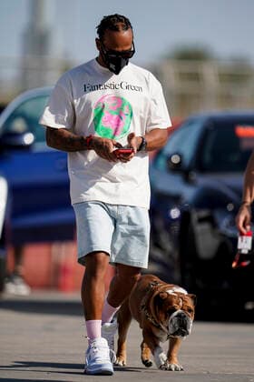 November 26, 2020, Sakhir, Bahrain: LEWIS HAMILTON of Great Britain and Mercedes F1 Team and his dog Roscoe, arrive at the track during preparations of the 2020 FIA Formula 1 Bahrain Grand Prix at Bahrain International Circuit in Sakhir. Sakhir Bahrain - ZUMAg147 20201126_zap_g147_002 Copyright: xJamesxGasperottix