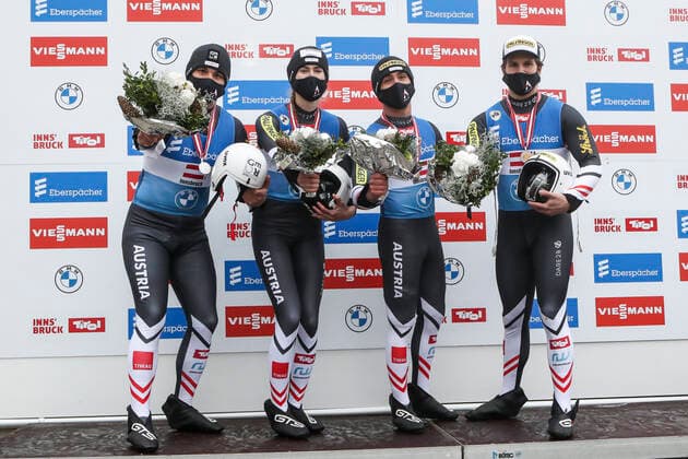 LUGE - FIL WC Innsbruck Igls 2020 INNSBRUCK,AUSTRIA,29.NOV.20 - LUGE - FIL World Cup Igls, artificial track, relay. Image shows the rejoicing of the austrian team. Keywords: trophy. GEPAxpictures xPatrickxSteiner