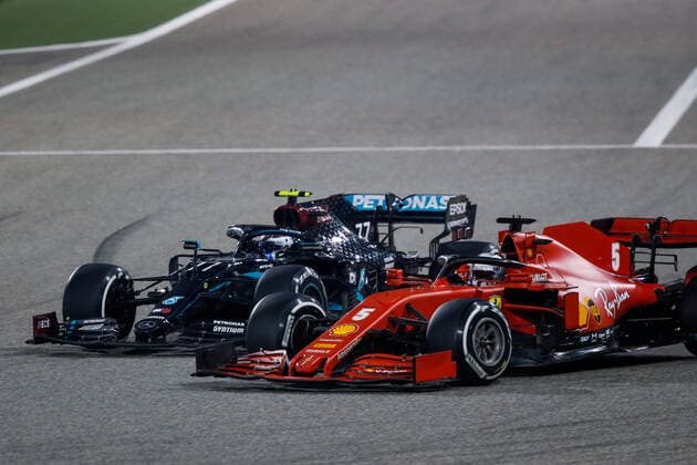 77 BOTTAS Valtteri (fin), Mercedes AMG F1 GP W11 Hybrid EQ Power+, action 05 VETTEL Sebastian (ger), Scuderia Ferrari SF1000, action during the Formula 1 Gulf Air Bahrain Grand Prix 2020, from November 27 to 29, 2020 on the Bahrain International Circuit, in Sakhir, Bahrain FORMULE 1 : Grand prix du Bahrein - Sakhir - Course - 29 11 2020 DPPI PANORAMIC  77_00120032__GDN6463