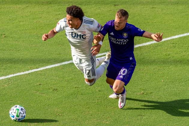 ORLANDO, USA, NOV 28TH Midfielder Nani ( 17 Orlando City) and Forward Cristian Penilla ( 70 New England) battle for the ball in the Major League Soccer Playoff match between Orlando City and New England at Exploria Stadium in Orlando *NO COMMERCIAL USAGE Stacy White SPP Orlando City v New England 