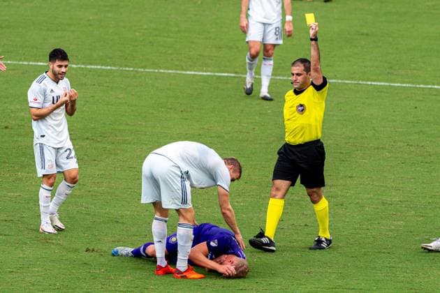 ORLANDO, USA, NOV 28TH Yellow card issues to New England during the Major League Soccer Playoff match between Orlando City and New England at Exploria Stadium in Orlando *NO COMMERCIAL USAGE Stacy White SPP Orlando City v New England 