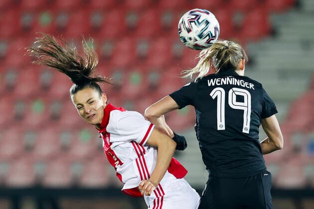 AMSTERDAM , 10-12-2020 , Sportpark de Toekomst , Dutch football , Champions League , season 2020 2021. (L-R) Ajax player Lucie Vonkova and Bayern Munchen player Carina Wenninger during the match Ajax vs Bayern Munchen women Ajax - Bayern Munchen women  Copyright: ToonxDompeling