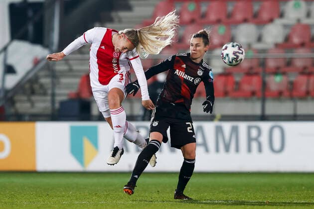 AMSTERDAM , 10-12-2020 , Sportpark de Toekomst , Dutch football , Champions League , season 2020 2021. (L-R) Ajax player Stefanie van der Gragt and Bayern Munchen player Simone Laudehr during the match Ajax vs Bayern Munchen women Ajax - Bayern Munchen women  Copyright: ToonxDompeling