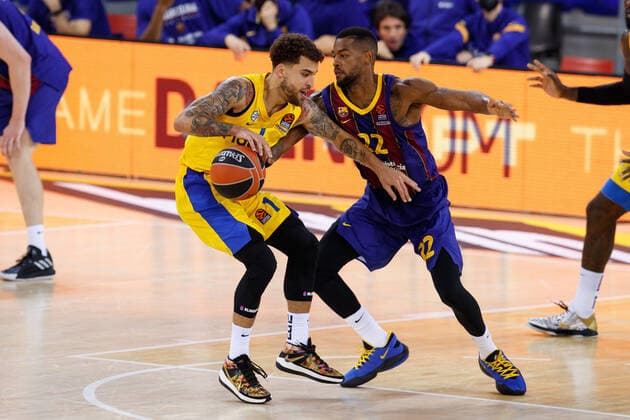 December 18, 2020, Barcelona, Spain: Tyler Dorsey of Maccabi Playtika Tel Aviv in action with Cory Higgins of FC Barcelona, Barca during the Turkish Airlines EuroLeague match between FC Barcelona and Maccabi Playtika Tel Aviv at Palau Blaugrana in Barcelona, Spain. Barcelona Spain - ZUMAd159 20201218_zia_d159_063 Copyright: xDavidxRamirezx