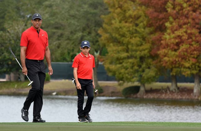 December 20, 2020, Orlando, Florida, United States: Tiger Woods and his son Charlie approach the 18th green during the final round of the 2020 PNC Championship golf tournament at the Ritz-Carlton Golf Club. .Justin Thomas and his father Mike finished in first place and Woods and his son finished seventh. Orlando United States - ZUMAs197 20201220_zaa_s197_172 Copyright: xPaulxHennessyx
