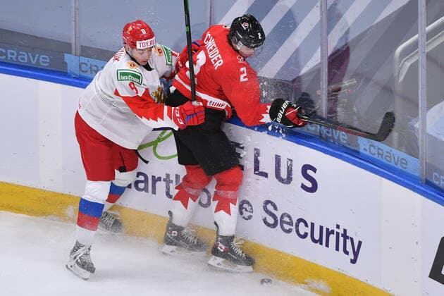 210105 Arseni Gritsyuk of Russia collides with Braden Schneider of Canada during the 2021 IIHF World Junior Championship semifinal between Canada and Russia on January 4, 2021 in Edmonton. Photo: Andy Devlin BILDBYRAN COP 306 AD0008 bbeng ishockey Ice hockey, Eishockey jvm junior-vm u20 2021 iihf world junior championship world juniors semifinal canada kanada russia ryssland Copyright: ANDYxDEVLIN BB210105BB040