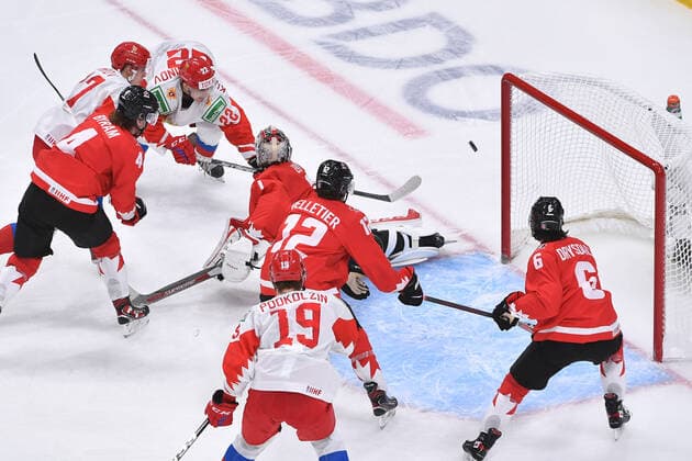 210105 Marat Khusnutdinov of Russia shoots the puck wide of the Canadian net during the 2021 IIHF World Junior Championship semifinal between Canada and Russia on January 4, 2021 in Edmonton. Photo: Andy Devlin BILDBYRAN COP 306 AD0008 bbeng ishockey Ice hockey, Eishockey jvm junior-vm u20 2021 iihf world junior championship world juniors semifinal canada kanada russia ryssland Copyright: ANDYxDEVLIN BB210105BB041
