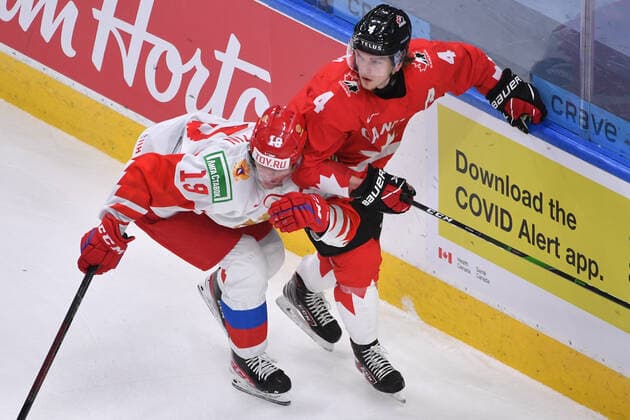 210105 Vasili Podkolzin of Russia collides with Bowen Byram of Canada during the 2021 IIHF World Junior Championship semifinal between Canada and Russia on January 4, 2021 in Edmonton. Photo: Andy Devlin BILDBYRAN COP 306 AD0008 bbeng ishockey Ice hockey, Eishockey jvm junior-vm u20 2021 iihf world junior championship world juniors semifinal canada kanada russia ryssland Copyright: ANDYxDEVLIN BB210105BB042