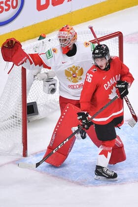 210105 Philip Tomasino of Canada gets his skate caught in the pad of Yaroslav Askarov of Russia during the 2021 IIHF World Junior Championship semifinal between Canada and Russia on January 4, 2021 in Edmonton. Photo: Andy Devlin BILDBYRAN COP 306 AD0008 bbeng ishockey Ice hockey, Eishockey jvm junior-vm u20 2021 iihf world junior championship world juniors semifinal canada kanada russia ryssland Copyright: ANDYxDEVLIN BB210105BB048