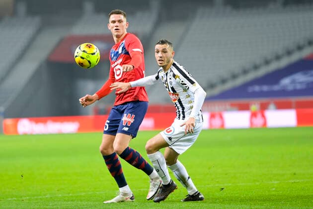 Sven Botman (Losc) vs Mathias Pereira Lage (Angers) FOOTBALL : LOSC vs Angers - Ligue1 Uber eats - 06 01 2021 JBAutissier Panoramic 