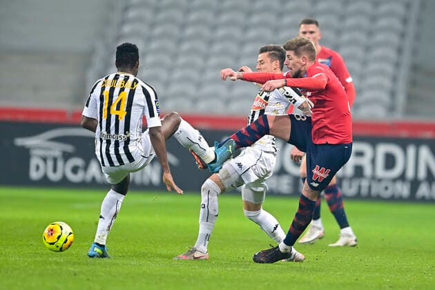 Xeka (Losc) vs Lassana Couylibaly (Angers) Pierrick Capelle (Angers) FOOTBALL : LOSC vs Angers - Ligue1 Uber eats - 06 01 2021 JBAutissier Panoramic 