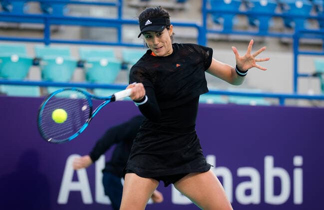 January 7, 2021, Abu Dhabi, UNITED ARAB EMIRATES: Garbine Muguruza of Spain in action during her first-round match at the 2021 Abu Dhabi WTA, Tennis Damen Womens Tennis Open WTA 500 tournament against Kristina Mladenovic of France Abu Dhabi UNITED ARAB EMIRATES - ZUMAa181 20210107_zaa_a181_153 Copyright: xRobxPrangex