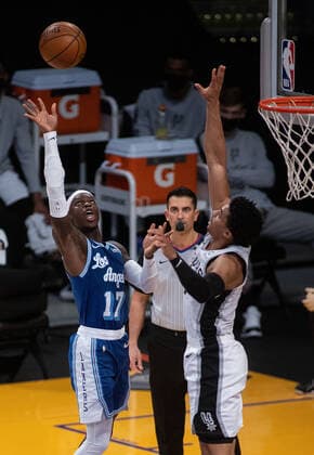 January 7, 2021, Los Angeles, California, USA: Dennis Schroder 17 of the Los Angeles Lakers tries to put a shot over Keldon Johnson 3 of the San Antonio Spurs during their regular season NBA, Basketball Herren, USA game on Thursday January 7, 2021 at the Staples Center in Los Angeles, California. Lakers lose to Spurs 118-109. JAVIER ROJAS PI Los Angeles USA - ZUMAp124 20210107_zaa_p124_028 Copyright: xJavierxRojasx