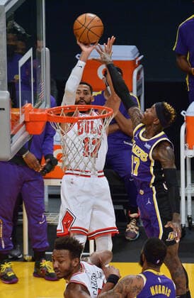 Chicago Bulls Garrett Temple scores a three pointer over Los Angeles Lakers Dennis Schroder during the first quarter at Staples Center in Los Angeles on Friday, January 8, 2021. The Lakers defeated the Bulls 117-115.  LAP2021010820 JIMxRUYMEN